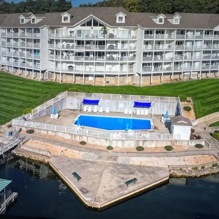Beautiful lake front condo in perfect location by land and water. Boat Slip.
