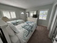 End unit with extra windows. Steps to the beach, private beach access!