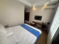 Home Inn Huayi Hotel (Daqing West Railway Station Kunlun Tangren Center) - 2-نجوم
