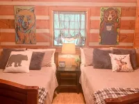 Cozy Cabin in woods with Hot Tub, Porch Swing Bed and Fire Pit in Aska Adventure - 3-Star