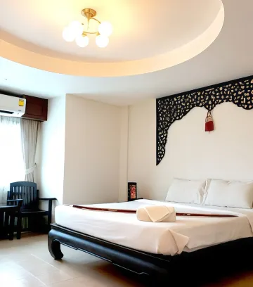 ห้องดีลักซ์ เตียงใหญ่ 1 เตียง