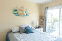 Only Five Steps From The Beach Access!
