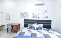 Homey Guesthouse Kertajaya (Syariah) - Pensionat