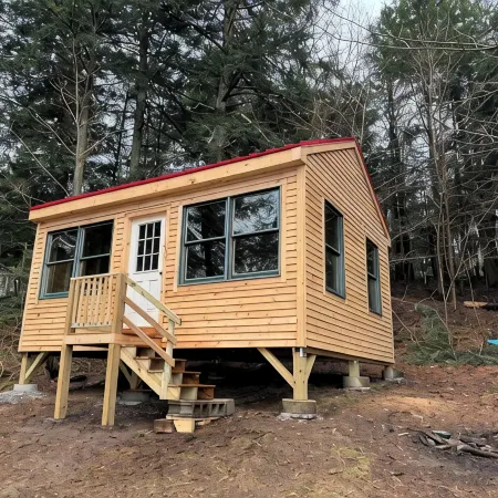 Maine Cabin Masters Camp completely redone waiting for a Lake loving family !