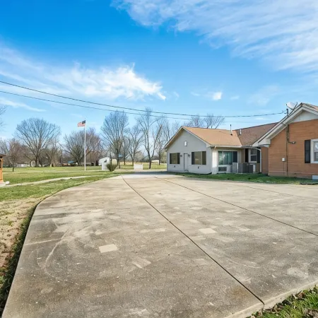Country Living at Its Best, with a Beautiful Stocked Pond to Fish IN