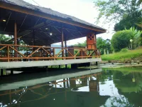 Ue Datu Cottages Hotel di Pamona Utara
