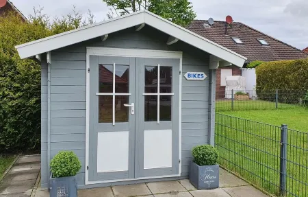 Comfortable vacation home with sauna in beautiful Neßmersiel Отели в г. Дорнум