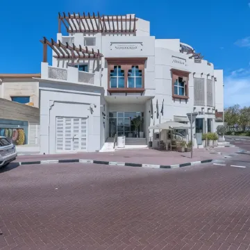 Beach Walk Boutique Hotel Отели рядом с достопримечательностью «Умм Сукейм»