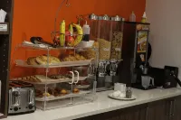 Howard Johnson by Wyndham Downtown Kamloops - Bữa sáng