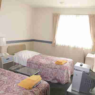 ビジネスホテル モトナカノ Rooms