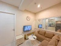Restful and Good Location 1BR Apartment at Trillium Residence By Travelio - Condos