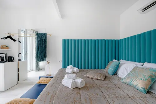 Cielo | Suite con Bagno e Cucina Condivisa – Centrale