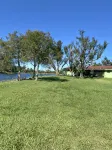 beautiful home on a 3 acre lake with security