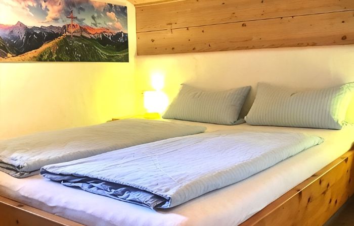 Family apartment with two separate bedrooms and unobstructed Zugspitze views