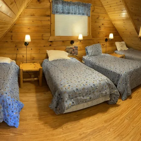 Entertainment Cabin: with 8 Large Screen TV's on 1 Wall.  Great for Small Groups