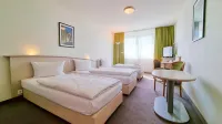 Panorama Inn Hotel und Boardinghaus - Balkon