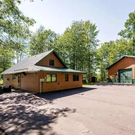 Secluded 4-season cabin w/private waterfront, epic game room & mins from trails