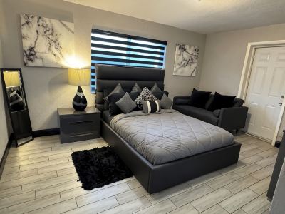 MASSIVE HOME WITH HEATED POOL, NEAR BEACH IN SUNNY SOUTH FLORIDA
