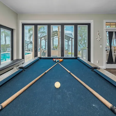 On the Gulf! Luxury 4/3 with 2 Master Bedrooms, Pool and Spa and Dock!