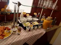 Stadt-Gut-Hotel Rheinischer Hof - servizio colazione