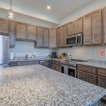 Musketeer Manor ~ 5 bedrooms & 4.5 baths off street parking & central location!!