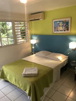 Coco-mango Apt. B, Studio Cosy, vue mer à 250 m de la Plage de la Perle - appartements de vacances