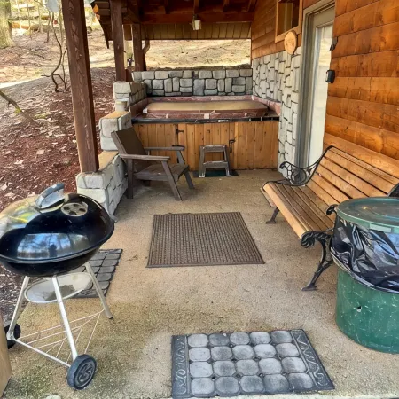 Adventurer's  Lodge, a charming 3-bedroom cabin with WiFi in quiet Lansing, WV.