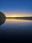 Cozy 3-bedroom Lake house with fiber Wifi, Boathouse & Dock on Lake Sinclair - 4-Star