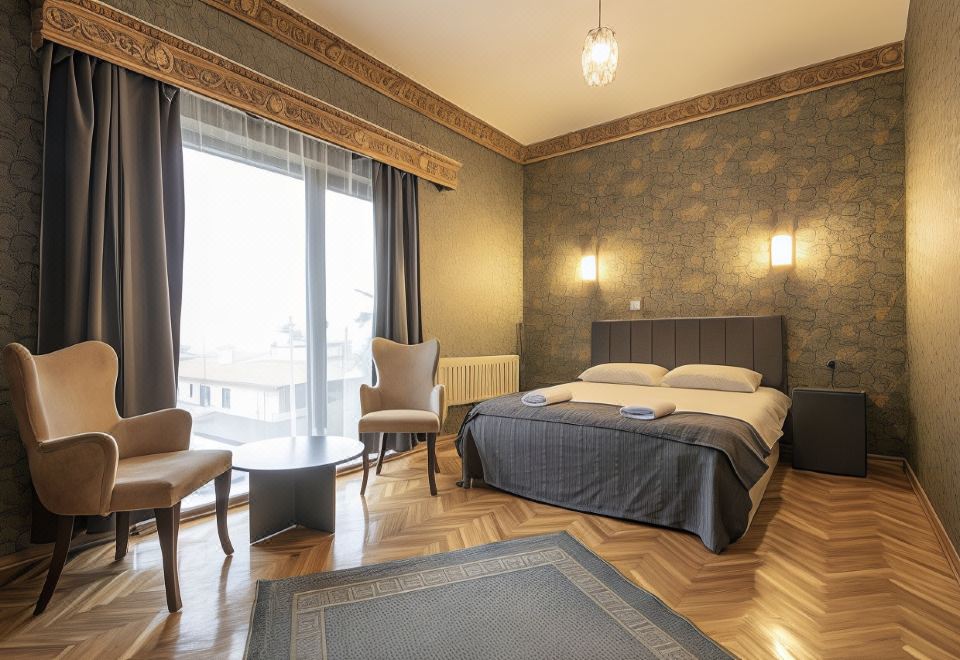Ares Business Suit Hotel - Housity