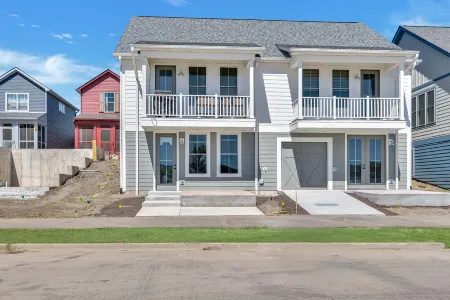 Marina Views and Cozy Deck - Charming Duplex Retreat