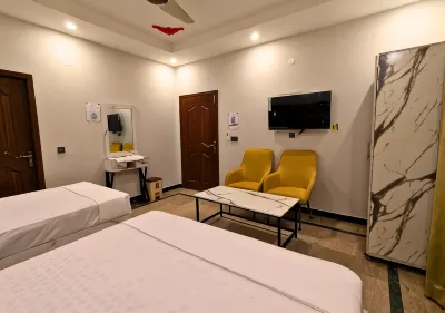 Dove Inn Hotel Wahdat Road Отели в г. 