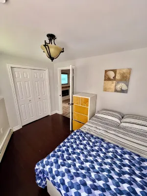 Private walkout basement apt with free parking spot.