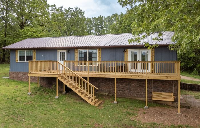 Brand New Farmhouse Style Listing with views of the beautiful Spring River!