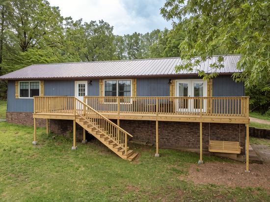 Brand New Farmhouse Style Listing with views of the beautiful Spring River!
