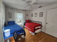 Charming lakefront 3BR 3BA house w/ EV chg in heart of Mt. Dora. Nature abounds.