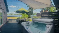 Luxury private Portage Lakes home lake access 3 bd Oasis Hottub pet friendly!