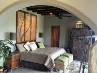 Spend the day at the Soggy Peso Palapa Bar, and spend the night in The Penthouse - Villas