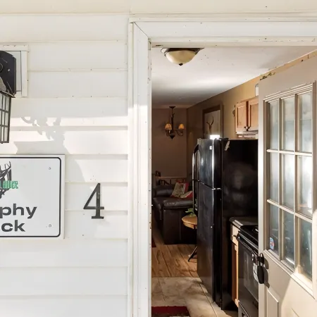 Trophy Buck sleeps 6, or rent all 4 for 20. Horseback riding across the Rd!