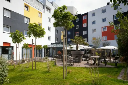 The Originals Boutique, Hôtel le Marmotel, Clermont-Ferrand Отели рядом с достопримечательностью «Собор Нотр-Дам дю Пор»