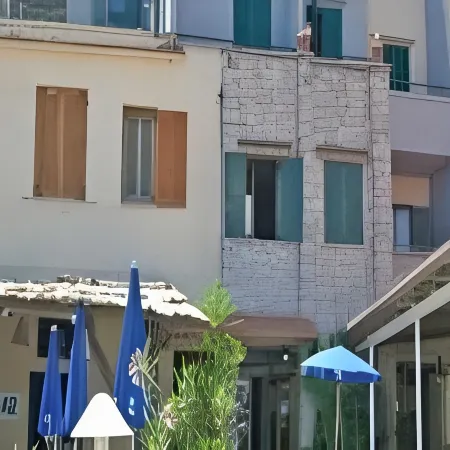 Hotel Baia di Puolo Отели рядом с достопримечательностью «Пляж Петерс»