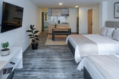 86 Suites Hoteles cerca de Zona T