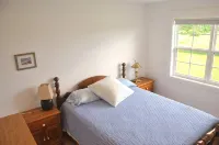 Renovated family cottage; walk to amazing beach, short drive to golf & town - 2-Star