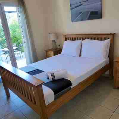 Short walk to the beach ,Four bedrooms four bathrooms sleeps 8 Rooms