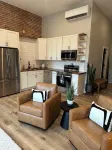 Stylish & Modern 2-Bdrm Apt in Downtown Warsaw featuring an urban rooftop deck.