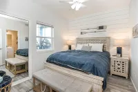 Luxury Beachfront Condo with Covered Deck Steps From Beach & Golf Cart Rental - 4-Star