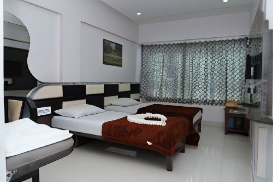 Tulsi Hotel - Housity