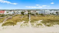 Comfortable, bright and sunny beach house.  Steps away from beach access.