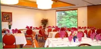 Oyster Bay Inn & Suites - Frühstück