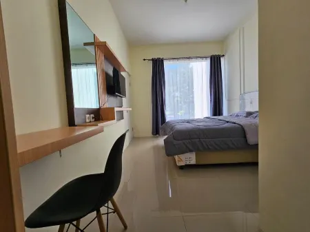 Ni_Er Guesthouse by Mr.Tsabalala Отели в г. Lumajang