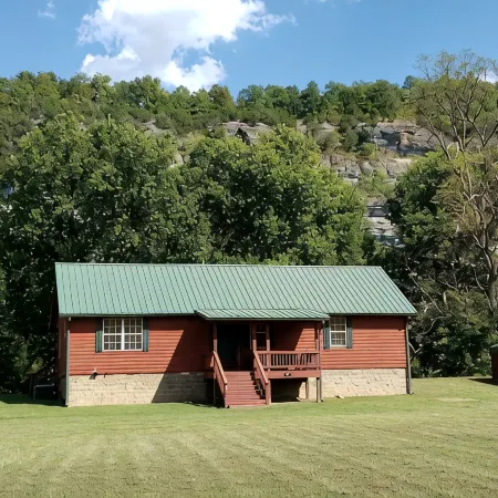Beautiful cabin style home backing up on the White River!